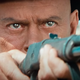 The Gunslinger aiming his rifle.